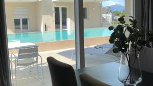 The swimming pool at or close to *CENTRAL LAKESIDE APT*Swimming Pool & Free Parking
