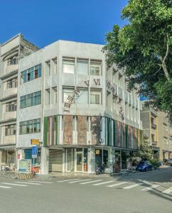 a building on the corner of a street at Romantic Time in Hualien City