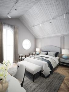 מיטה או מיטות בחדר ב-Sang Boutique Villa