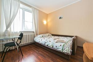 Cama o camas de una habitación en City Inn Apartment Sokolniki