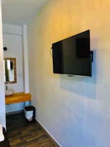 تلفاز و/أو أجهزة ترفيهية في Hotel Casa Valentina