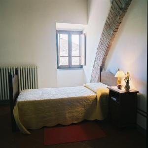 En eller flere senger på et rom på Residenza Antica Canonica
