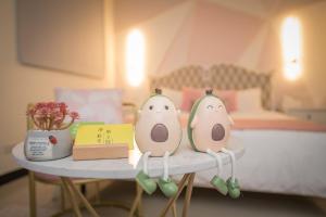 Giường trong phòng chung tại 漫時光 旅空間 ManLu INN
