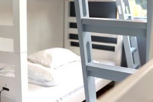 Krevet ili kreveti u jedinici u okviru objekta Guesthouse All you need - All rooms have an ocean view!