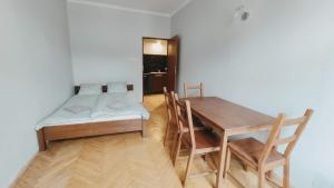 Posteľ alebo postele v izbe v ubytovaní Floriańska 10 by Homeprime