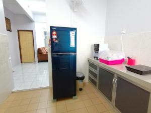 Η κουζίνα ή μικρή κουζίνα στο YITOM Homestay易通民宿 +1 φωτογραφίες