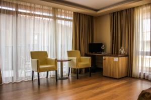 TV a/nebo společenská místnost v ubytování Family Hotel Casa del Mare