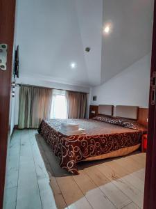 Postel nebo postele na pokoji v ubytování Family Hotel Casa del Mare