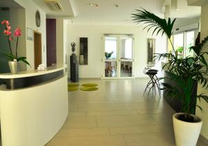 The lobby or reception area at Hotel Lugano