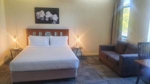 Postel nebo postele na pokoji v ubytování Hotel Cavalier