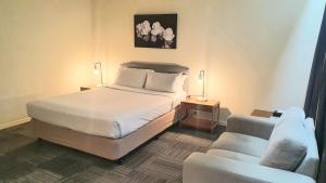 Postel nebo postele na pokoji v ubytování Hotel Cavalier