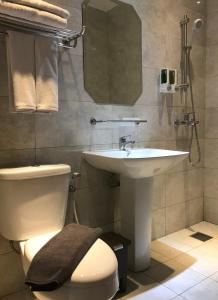 Baðherbergi á Hotel Arisu