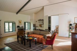 a living room with a couch and a table at Torre Camigliati Dimora Storica in Camigliatello Silano +73 photos