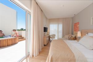 A bed or beds in a room at TUI Blue Barut Andız - All Inclusive - Adults Only