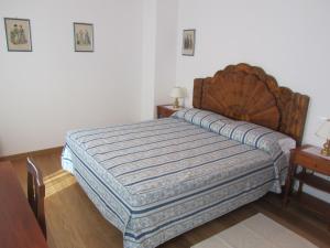 A bed or beds in a room at Agriturismo Villa Selvatico