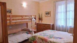 A bed or beds in a room at La locanda dell'artista