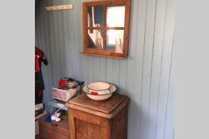 a room with a window and a bowl on a table at Sommarstugan in Äspered