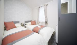 Posteľ alebo postele v izbe v ubytovaní Camping 't Veerse Meer