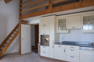 Kuchyň nebo kuchyňský kout v ubytování Enjoy Square - Spacious Holiday Home near Maredsous