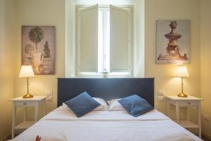 Uma cama ou camas num quarto em Truly Verona
