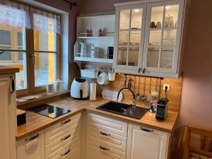 A kitchen or kitchenette at Appartementhaus Alma
