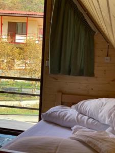 Postel nebo postele na pokoji v ubytování Cottage in Juta