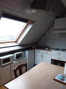 Dapur atau dapur kecil di Chambres d’hotes vue sur la Campagne