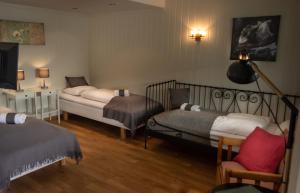 Кровать или кровати в номере Storestølen Fjellhotell