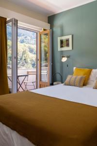 Postel nebo postele na pokoji v ubytování Hotel Carvalho Araujo