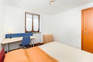 Ένα ή περισσότερα κρεβάτια σε δωμάτιο στο Casa Angeletti