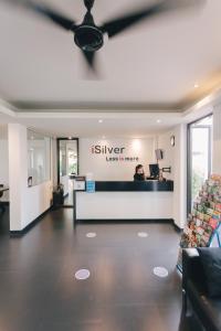 an isuzu store with a person in the background at iSilver Hotel in Chiang Mai +40 photos