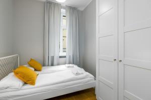 Posteľ alebo postele v izbe v ubytovaní Old Town Apartment Garbary by Noclegi Renters
