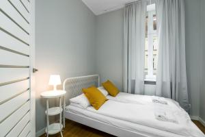 Posteľ alebo postele v izbe v ubytovaní Old Town Apartment Garbary by Noclegi Renters