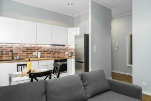 Posedenie v ubytovaní Old Town Apartment Garbary by Noclegi Renters
