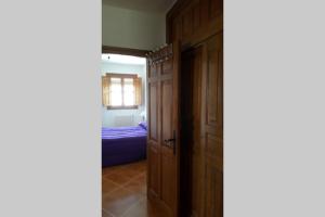 Postel nebo postele na pokoji v ubytování Apartamento Rústico VILLA MOCA Bubión