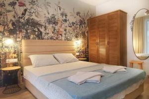 Sozopol Homes Z&Z apartments tesisinde bir odada yatak veya yataklar