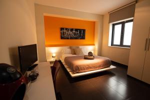 Łóżko lub łóżka w pokoju w obiekcie Hotel Los Nardos