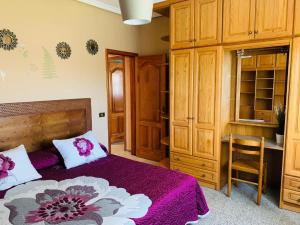 A bed or beds in a room at Vivienda Vacacional FLORATERE