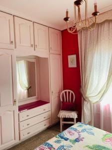 A bed or beds in a room at Vivienda Vacacional FLORATERE