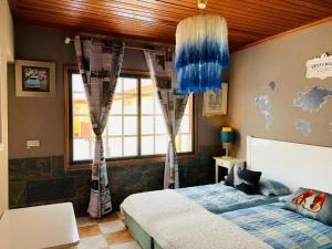 A bed or beds in a room at Vivienda Vacacional FLORATERE