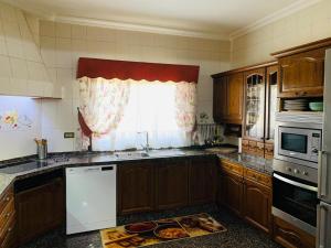 A kitchen or kitchenette at Vivienda Vacacional FLORATERE