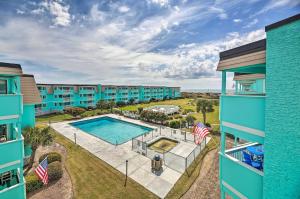 an aerial view of an apartment complex with a swimming pool at Beachfront Condo with Boardwalk and Pool Access! in Atlantic Beach