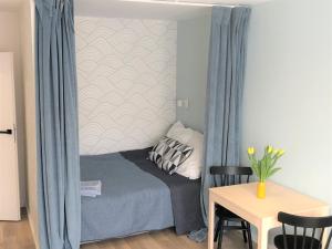 Posteľ alebo postele v izbe v ubytovaní Apartament Blisko Morza i Parku Gdańsk Brzeźno