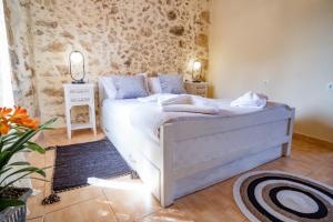 Posteľ alebo postele v izbe v ubytovaní Villa Styliani