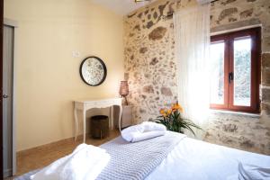 Posteľ alebo postele v izbe v ubytovaní Villa Styliani