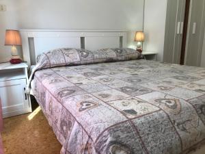 Postel nebo postele na pokoji v ubytování A 2 passi da tutto