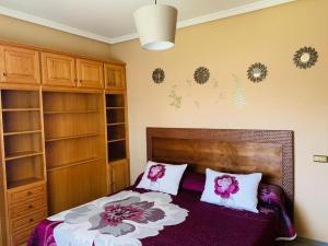 A bed or beds in a room at Vivienda Vacacional FLORATERE