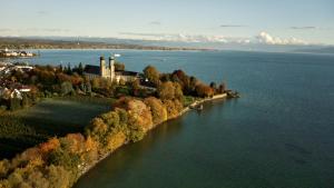 an island in the middle of a large body of water at Ferienwohnung Schneider Friedrichshafen in Friedrichshafen
