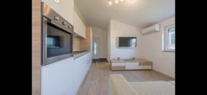 Kuchnia lub aneks kuchenny w obiekcie Aurum luxury apartments