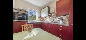 Kuchnia lub aneks kuchenny w obiekcie Aurum luxury apartments